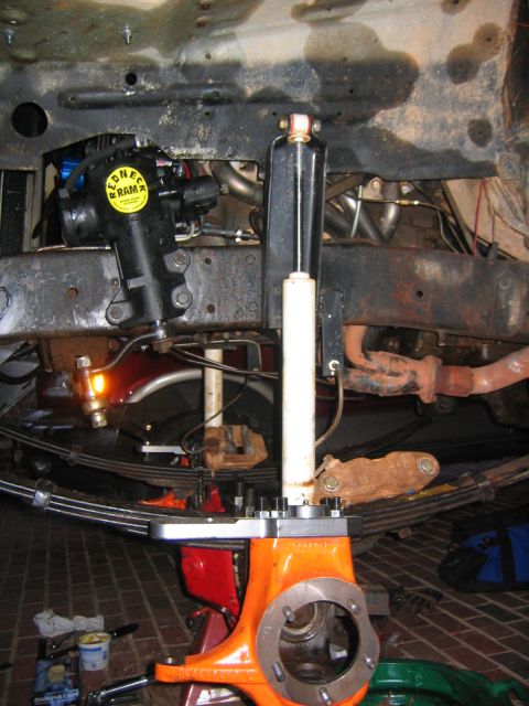 1979 Ford Bronco - Vehicle suspension and steering parts, including a steering gear labeled 'REDNECK RAM'.