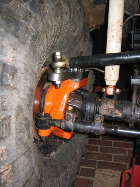 1979 Ford Bronco - Custom front axle components and suspension on a modified off-road vehicle are visible.
