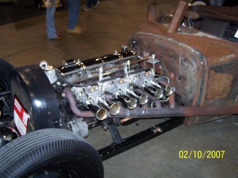 1979 Ford F-150 - This hot rod features a custom V8 engine with six carburetors and shiny exhaust headers.
