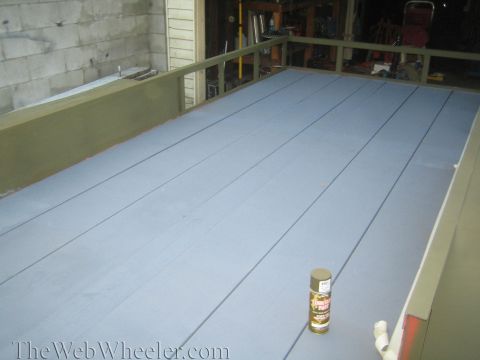 1987 Suzuki Samurai - Spray paint can sits on a freshly painted trailer deck.