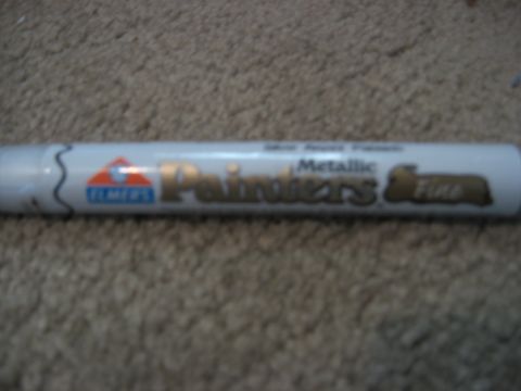 1979 Ford Bronco - Elmer's Painters & Fine paint marker is shown on a carpeted surface.