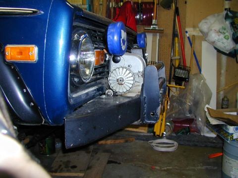 1979 Ford Bronco - Front view of a 1979 Ford Bronco, modified with a winch and blue light covers.