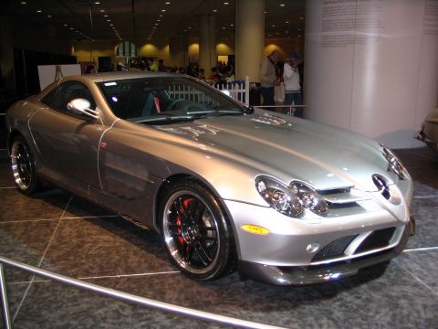 1993 Ford Taurus - A silver Mercedes-Benz SLR McLaren is displayed at an auto show.
