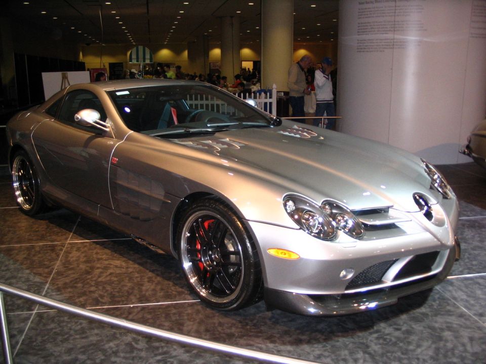 Silver Mercedes-Benz SLR McLaren sports car on display indoors