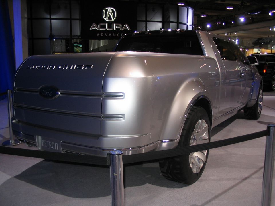 Silver pickup truck concept with 'DETROIT' text on the front bumper