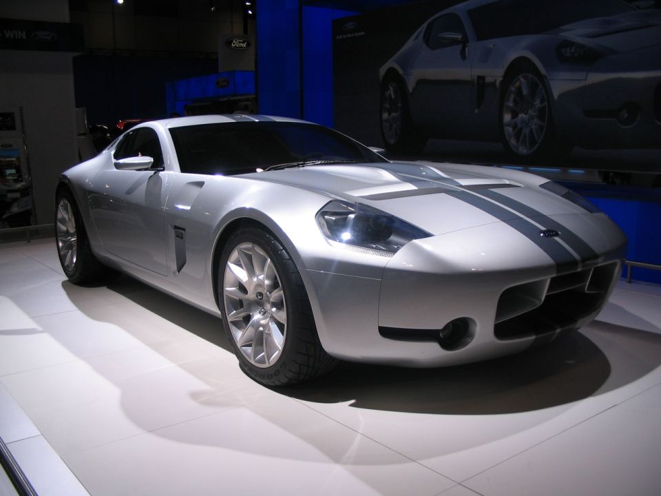 Silver Ford Shelby GR-1 concept car with dual racing stripes on display