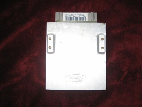 1994 Ford Bronco - This Ford engine control module has a label with 'A9L' and a date of '94'.