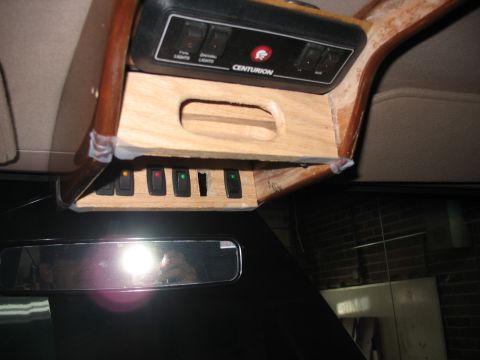 1995 Ford C-350 (Centurion Conversions) - Overhead console with Centurion branding and various toggle switches.