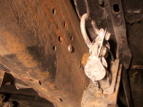 1995 Ford C-350 (Centurion Conversions) - Detail of undercarriage components, likely part of a braking system.