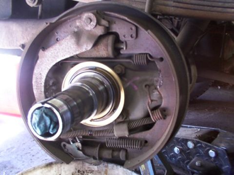 1995 Ford C-350 (Centurion Conversions) - Drum brake assembly showing internal components like shoes, springs, and hub.