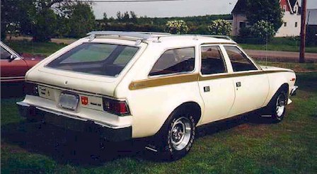 1973 Ford Ranchero - This 1973 AMC Hornet Sportabout station wagon is seen from the rear quarter angle. The vehicle is white with a gold stripe along the side.