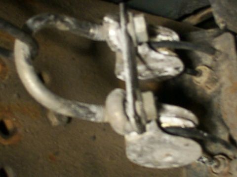 1995 Ford C-350 (Centurion Conversions) - Detail of a suspension component, likely part of a larger vehicle's undercarriage.
