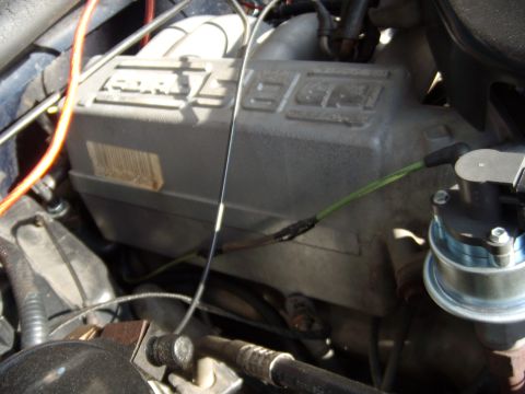 1992 Ford Bronco - Detail of a Ford engine's intake manifold, showing various components and wiring.