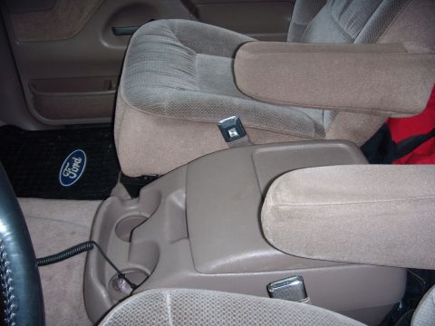 1992 Ford Bronco - Interior view of a 1992 Ford Bronco, highlighting the seats and center console.