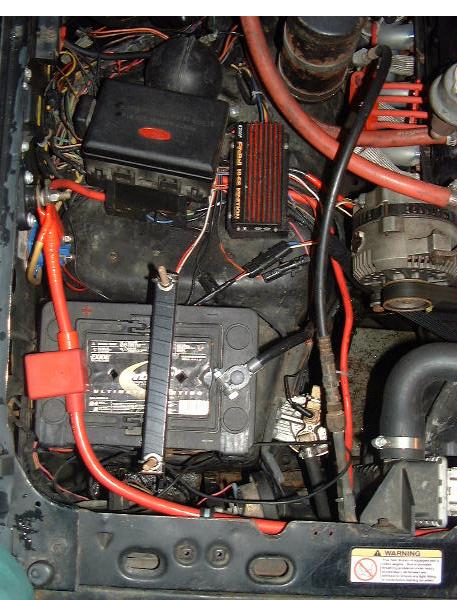1986 Ford Bronco - Battery 1 again. I use a 1G negative cable to the frame. Also seen is my fuse panel (from Yellow 4G) it feed all my trucks power needs. One…
