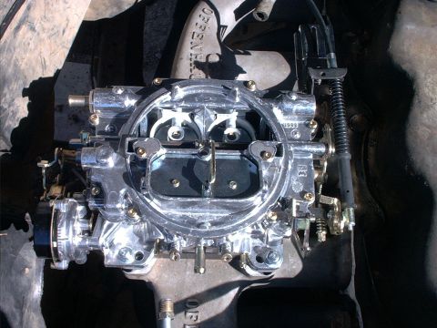 1985 Ford Bronco - Carburetor part shown in detail, likely from an older vehicle's engine bay.