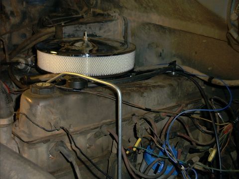 1985 Ford Bronco - Close-up of an engine bay, focusing on the air cleaner and engine components.