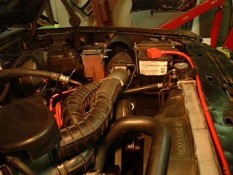 1986 Ford Bronco - Battery 2 behind air filter.