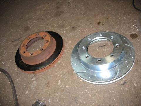 1995 Ford C-350 (Centurion Conversions) - Comparison of a used brake rotor and a new performance brake rotor.