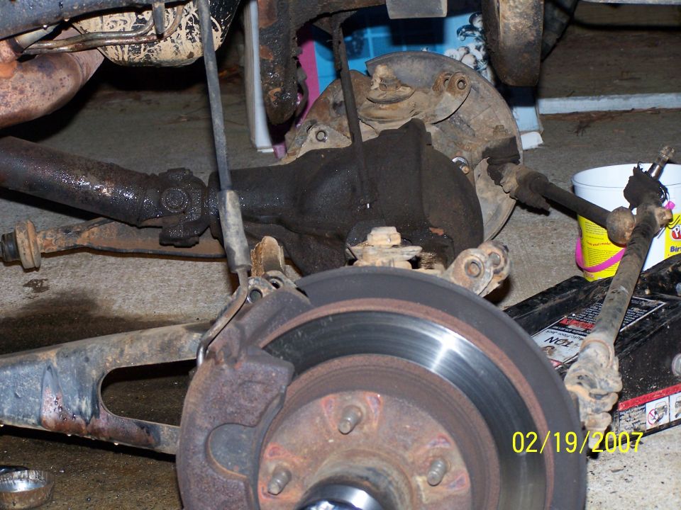 Rear axle and suspension parts with a date stamp of 02/19/2007