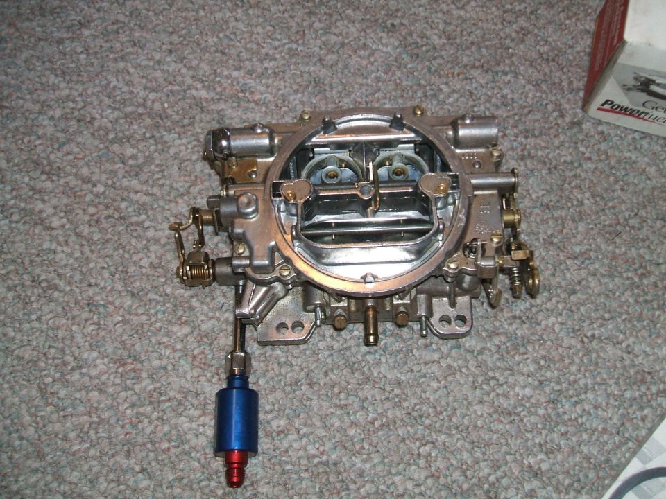 Holley carburetor with blue fuel filter