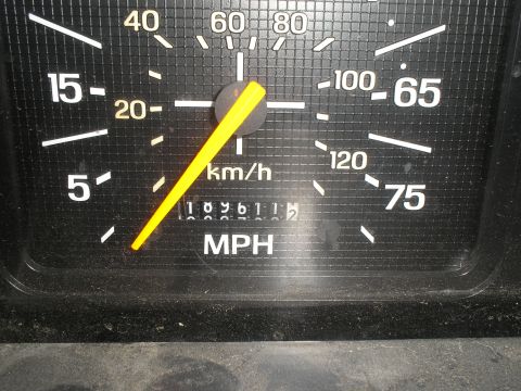 1999 Ford F-800 - The odometer reads 109,611 miles on this vehicle's dashboard gauge cluster.