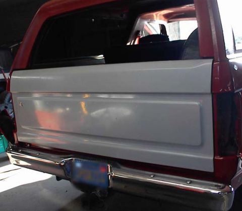 1986 Ford Bronco - You can buy this top of the line fiberglass tailgate from Autofab in CA. Sit down, its $750!