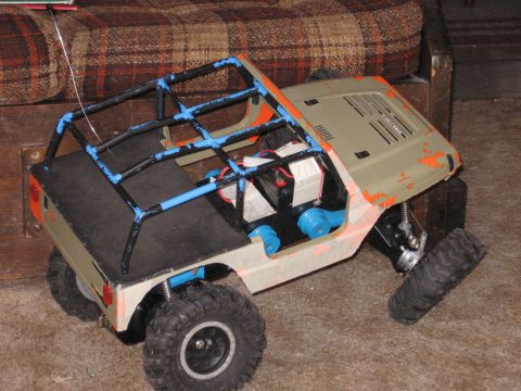 1984 Ford Bronco - This remote-controlled vehicle has a custom roll cage and exposed internal components.