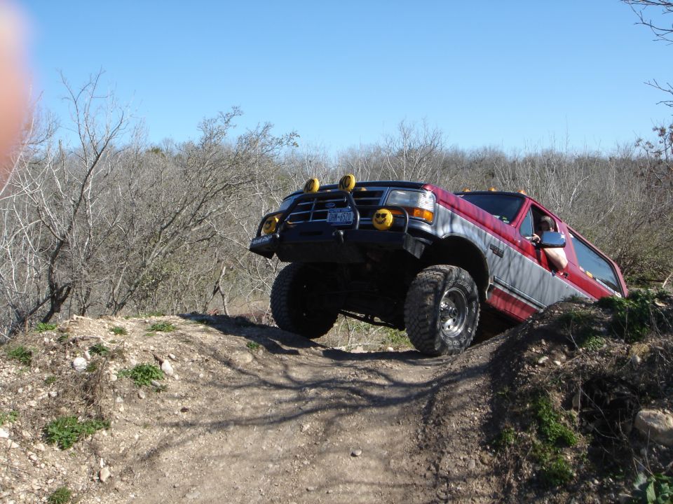 Ford F-series truck going off-road, front end lifted