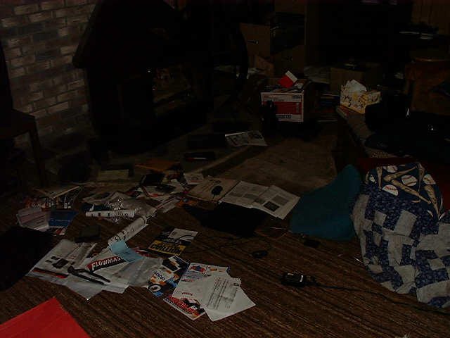 Here is my research station with my Laptop, books, and articals filed with libray...  Okay its my messy basment den!