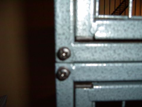 1993 Ford Bronco - Detail of screws fastening the metal frame of a cage.