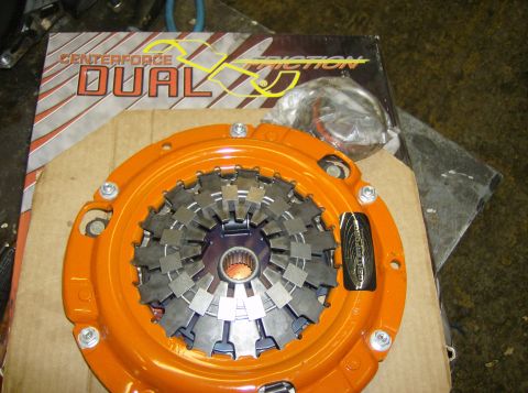 1996 Ford Probe - A Centerforce Dual Friction clutch assembly is shown, with its packaging visible in the background.