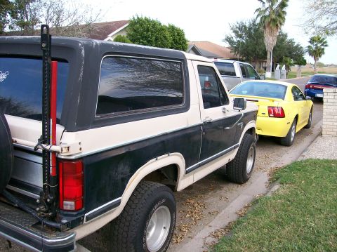 1981 Ford Bronco - This 1981 Ford Bronco features a two-tone paint scheme and a Hi-Lift jack attached to the rear.