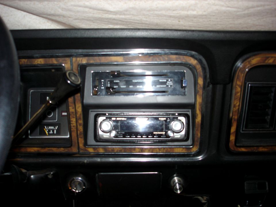 Woodgrain truck dash with slider heater controls and aftermarket stereo