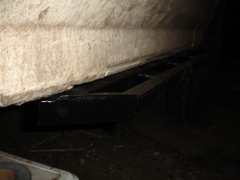 1989 Ford Bronco - This photo shows the side of a vehicle, focusing on the rocker panel and an installed slider.
