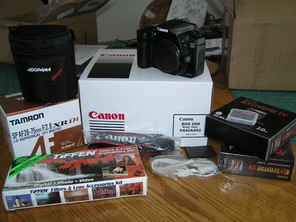 Canon EOS 20D camera body on retail box with Tamron lens box and CompactFlash cards