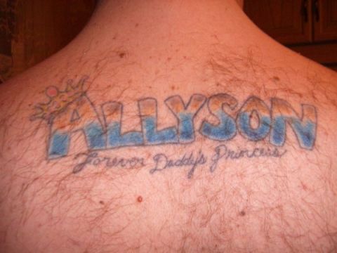 1993 Ford Bronco - A tattoo of the name Allyson is visible on a person's back, with a crown and script text.