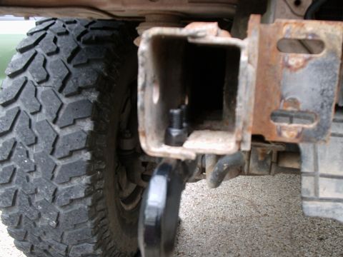1996 Ford Bronco - Mark and drill the holes then bolt on the hooks. If you drill the hole right, the flat side of the nut will but up agains the edge of the i…