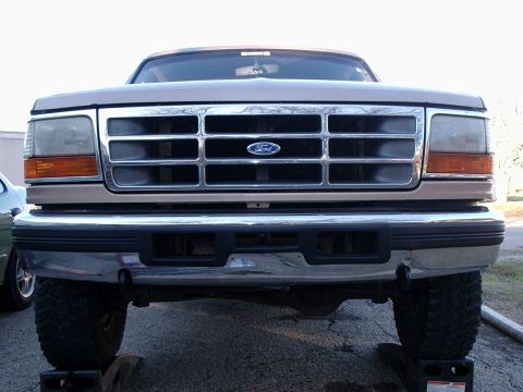 1996 Ford Bronco - Front view of a 1996 Ford Bronco, showing the grille and bumper.