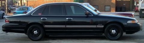 1989 Lincoln Town Car - This black sedan has a distinct body style that does not match the claimed 1989 model year.