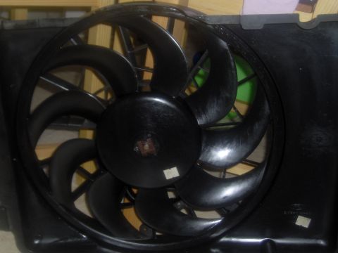1968 Ford Mustang - Radiator fan assembly with nine blades, part of a vehicle's cooling system.