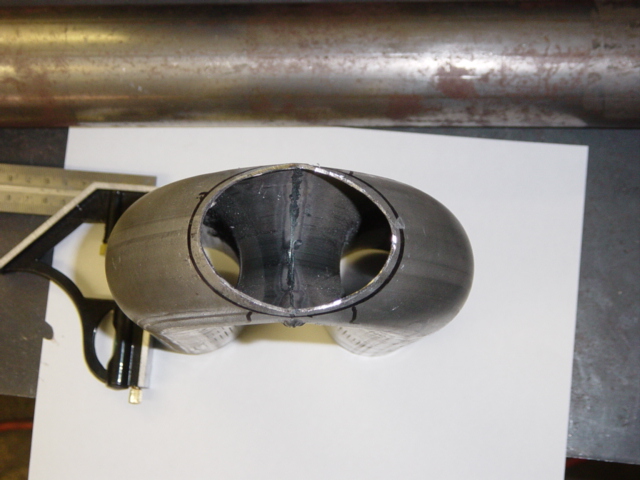 Exhaust pipe section with ruler and square