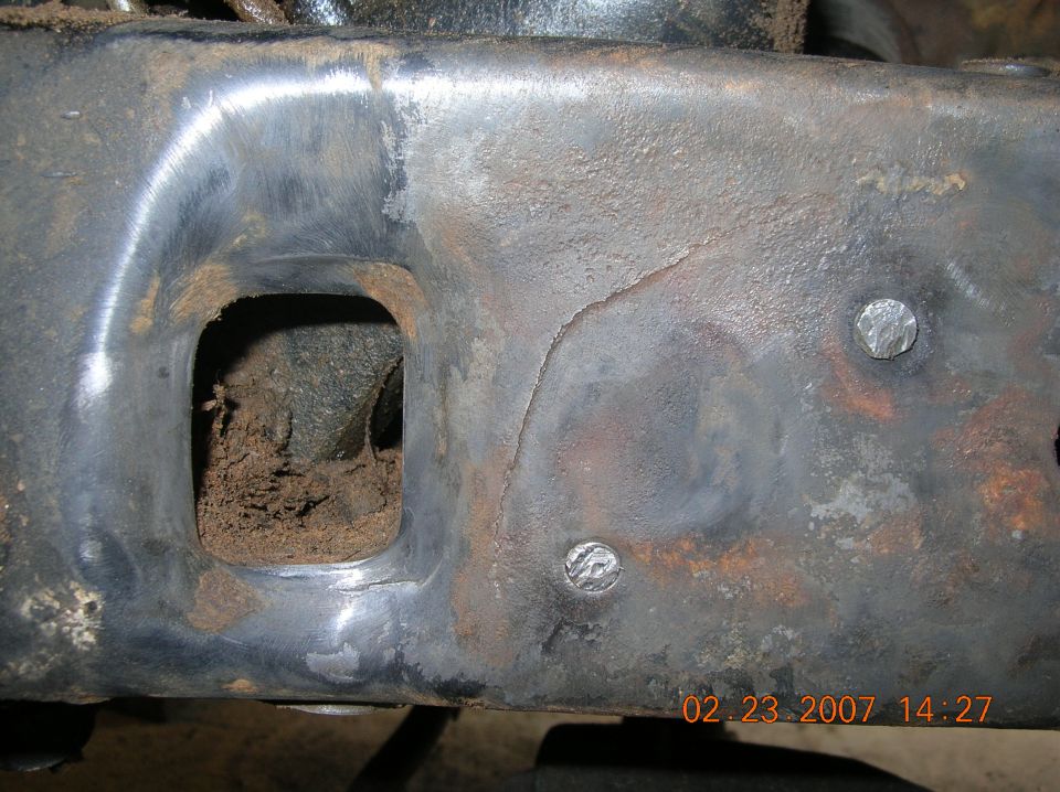 Crack in driver side frame rail (again), to the rear of the steering box, behind factory TTB coil mounts.