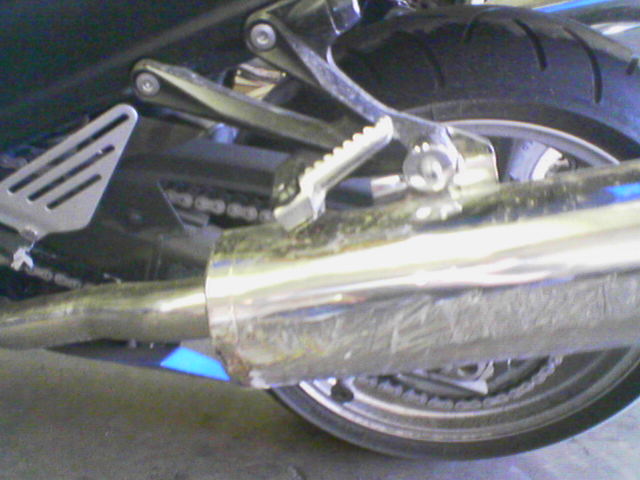 Polishing chrome with asphalt is not a good idea.