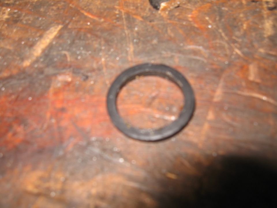 Rubber seal on a wooden surface