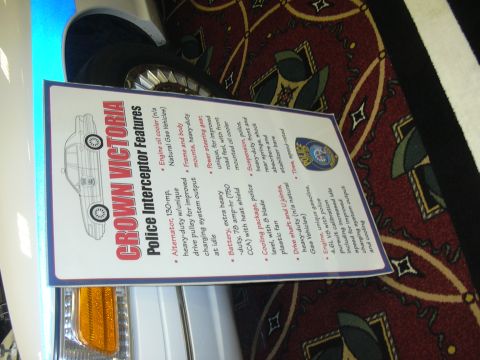 1996 Ford Crown Victoria - A document detailing the features of a Crown Victoria Police Interceptor is displayed.