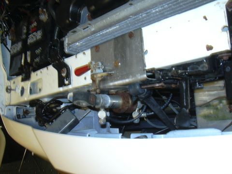 1996 Ford Crown Victoria - Close-up view of engine bay components, including radiator and fuel lines, with a Supermotors.net watermark.