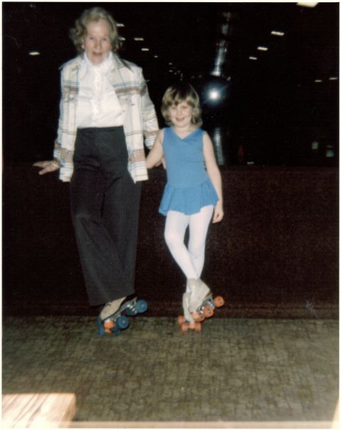 1986 Ford Bronco - An adult and child pose for a photo while wearing roller skates at an indoor rink.