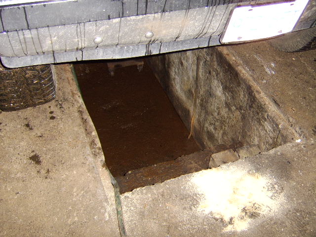 My dads garage with a pit he got put in about 25 years ago