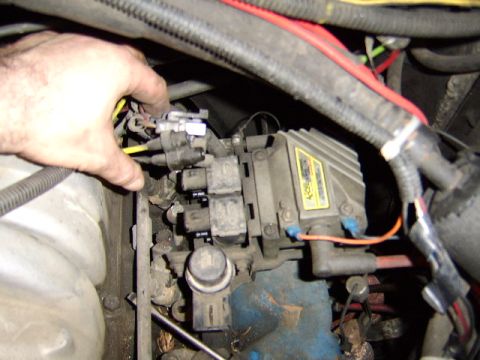 1989 Ford Bronco - now I am disconnecting the vacuum lines and electrical plugs from these dohickys (Its late, I can't think of the name (s) right now, LOL